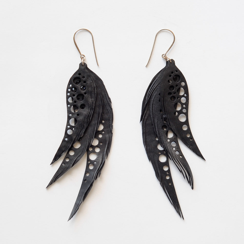 
                      
                        Tyre Tube Earrings "Feather Dots"
                      
                    